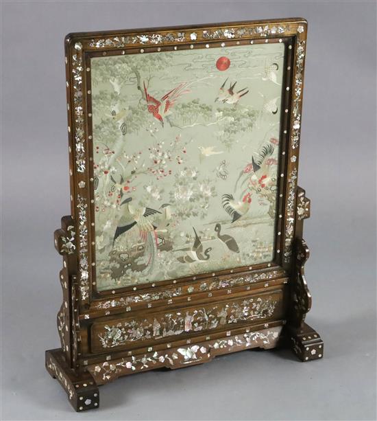 A Chinese embroidered silk, hongmu and mother of pearl framed table screen, c.1900, total size H.80cm W.62cm